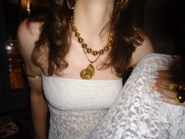 SEA SPIRAL NECKLACE GOLDEN ECHO