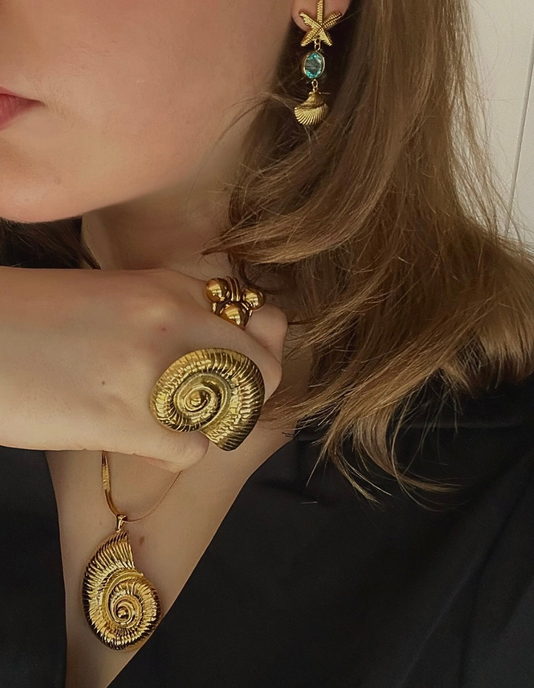 SEA SPIRAL RING GOLDEN ECHO