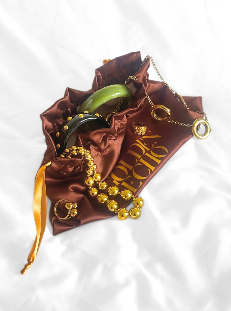 THE GOLDEN ECHO GIFT POUCH GOLDEN ECHO