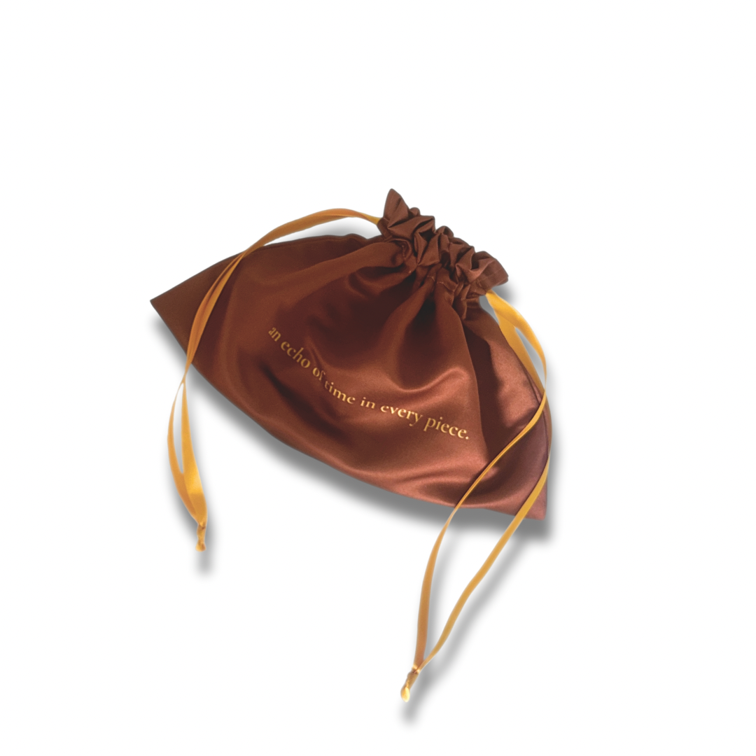 THE GOLDEN ECHO GIFT POUCH GOLDEN ECHO